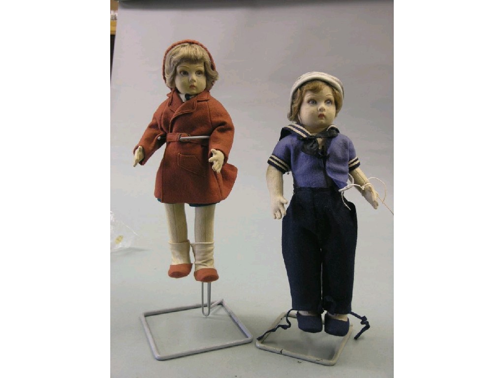 Appraisal: Two felt dolls possibly Chad Valley each with painted facial