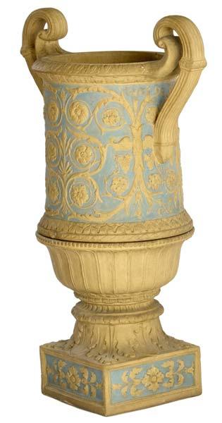 Appraisal: ROOKWOOD Large terra cotta garden urn and stand decorated in