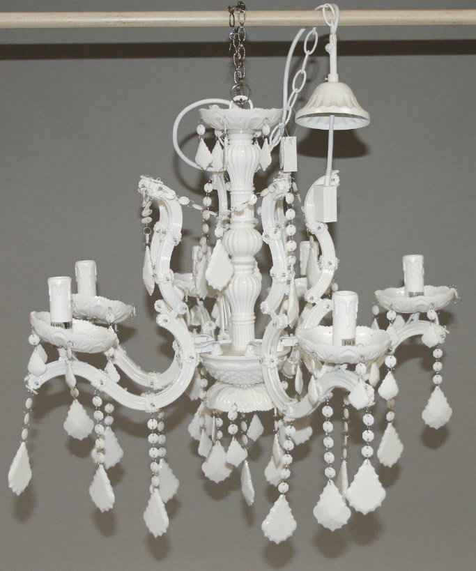 Appraisal: A six branch chandelier suspended with various drops