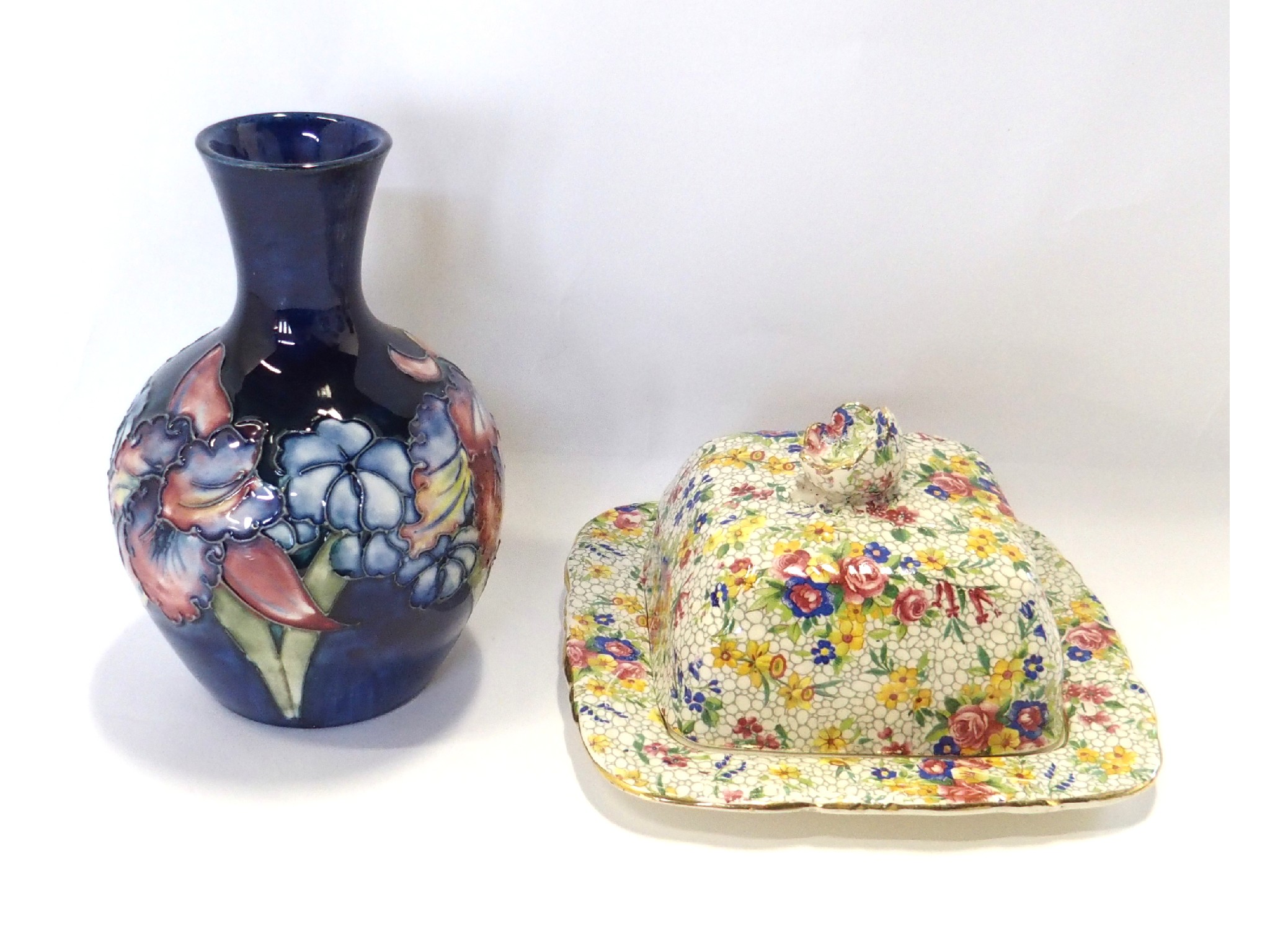 Appraisal: Moorcroft Frilled and Slipper Orchid pattern vase and a Royal