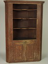 Appraisal: CUPBOARD - th C pine country Chippendale corner cupboard with