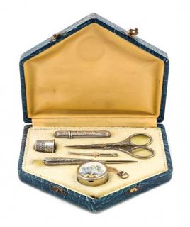 Appraisal: An Art Deco Silvered Metal Sewing Kit fitted with a