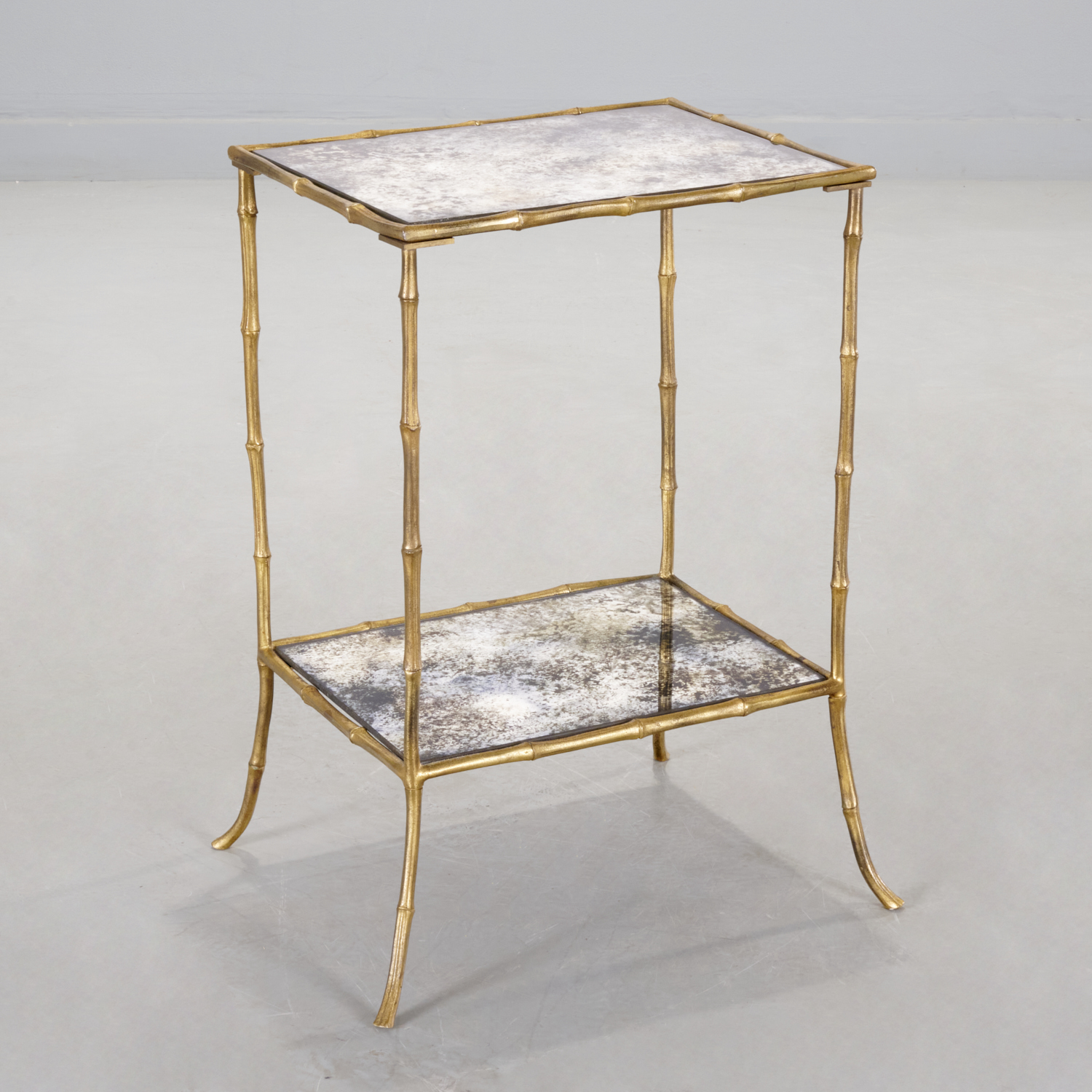 Appraisal: MASION BAGUES GILT BRONZE TWO-TIER SIDE TABLE Mid- th c