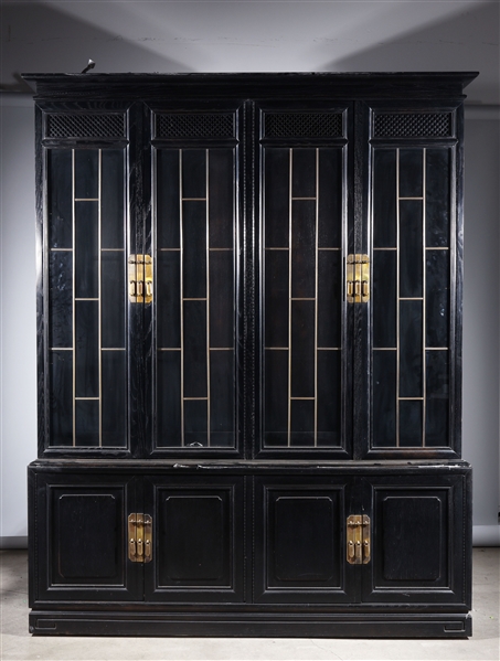 Appraisal: Large wooden display cabinet with glass panels and brass fixtures