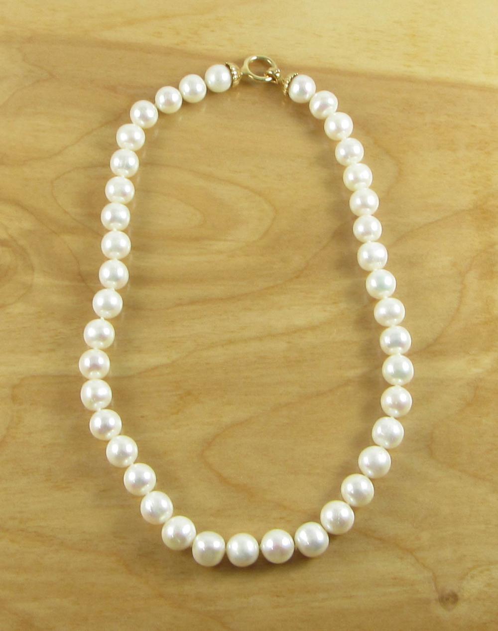 Appraisal: PRINCESS LENGTH PEARL AND FOURTEEN KARAT GOLD NECKLACE The -