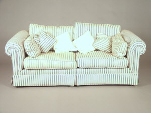 Appraisal: A blue and cream stripe upholstered two seater sofa th