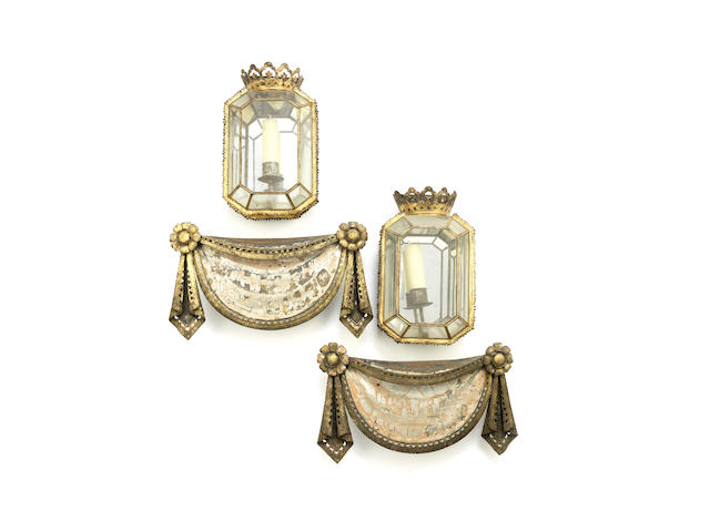 Appraisal: A pair of gilt painted tole wall mounted candle lanterns