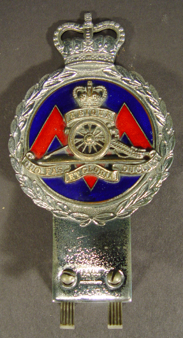 Appraisal: Chrome car radiator badge of military interest the central blue