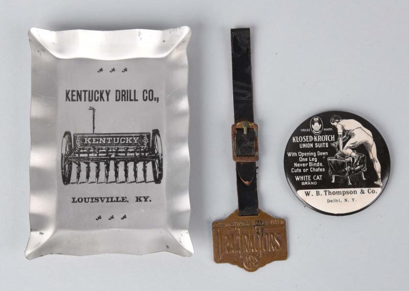 Appraisal: Lot Of Advertising Items This lot includes a Kentucky drill