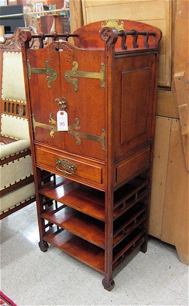 Appraisal: LATE VICTORIAN MAHOGANY FINISH MUSIC CABINET American c featuring a