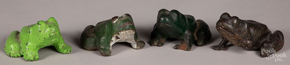 Appraisal: Four cast iron frog doorstops Four cast iron frog doorstops