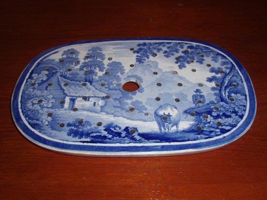 Appraisal: A th Century blue and white mazarine with primitive cow