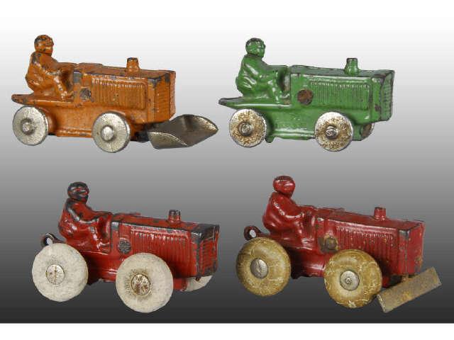 Appraisal: Lot of Small Cast Iron Kilgore Tractor Toys Description Various