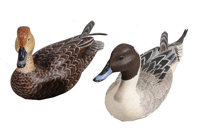 Appraisal: MIKE WOODA pair of carved and painted ducks in the