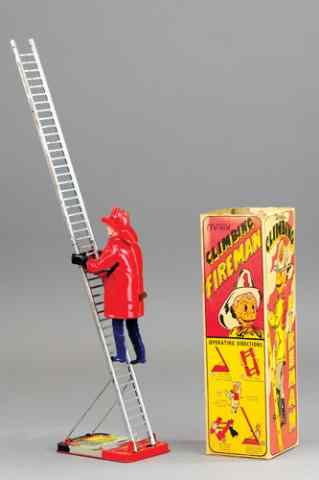 Appraisal: MARX BOXED CLIMBING FIREMAN Plastic fireman figure able to climb