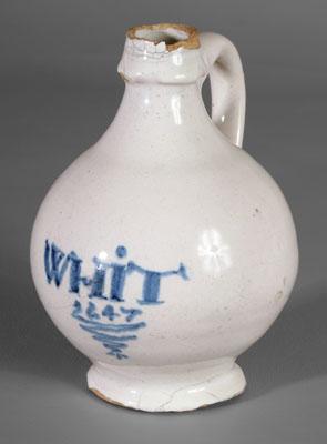 Appraisal: Delft wine bottle white-glazed globular form with shaped spout and