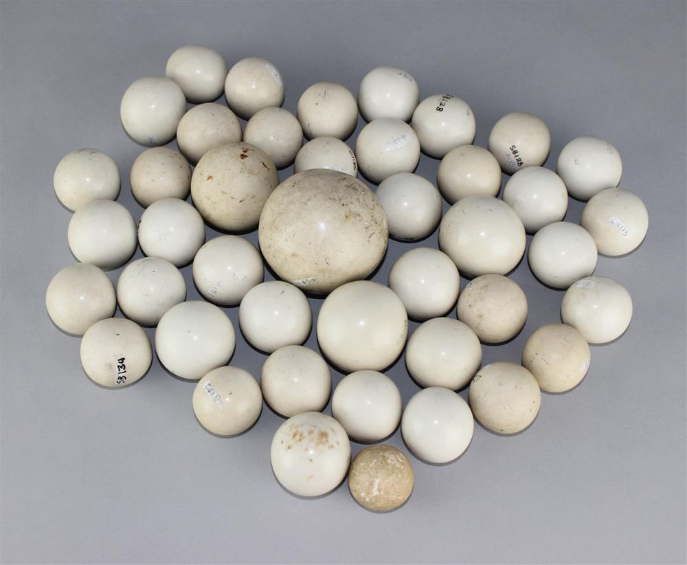 Appraisal: STONE GAMING BALLS OF VARYING SIZES all made of white