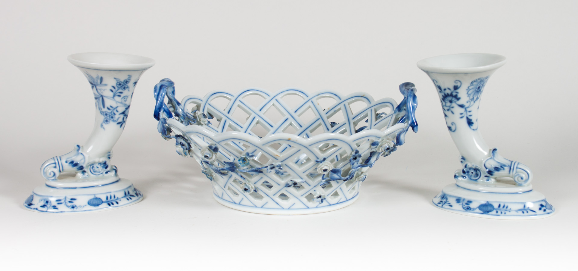 Appraisal: Meissen Blue Onion basket and cornucopia vases th century reticulated