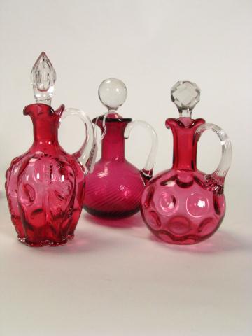 Appraisal: Three Victorian Cranberry Glass Cruets various patterns all with clear