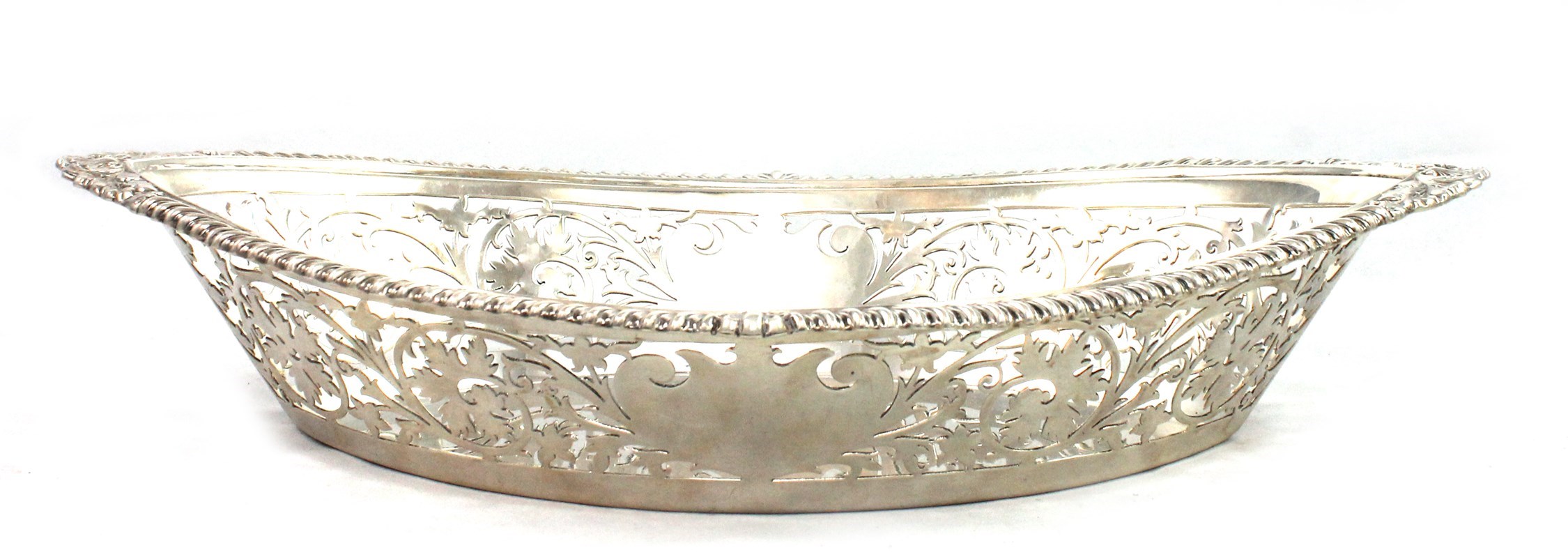 Appraisal: A silver boat shaped bread or fruit basket the sides