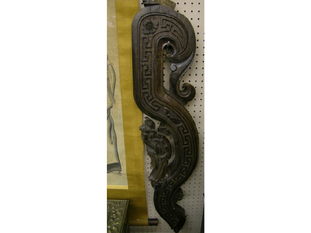 Appraisal: Two antique carved-wood Asian motif wall hangings