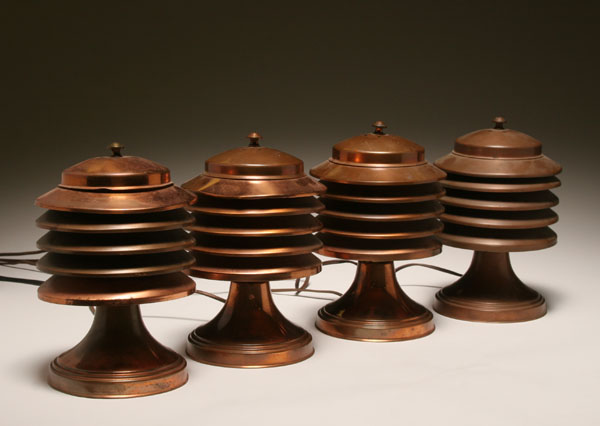 Appraisal: Four Machine Age copper lamps Canada mfg layered louvered design