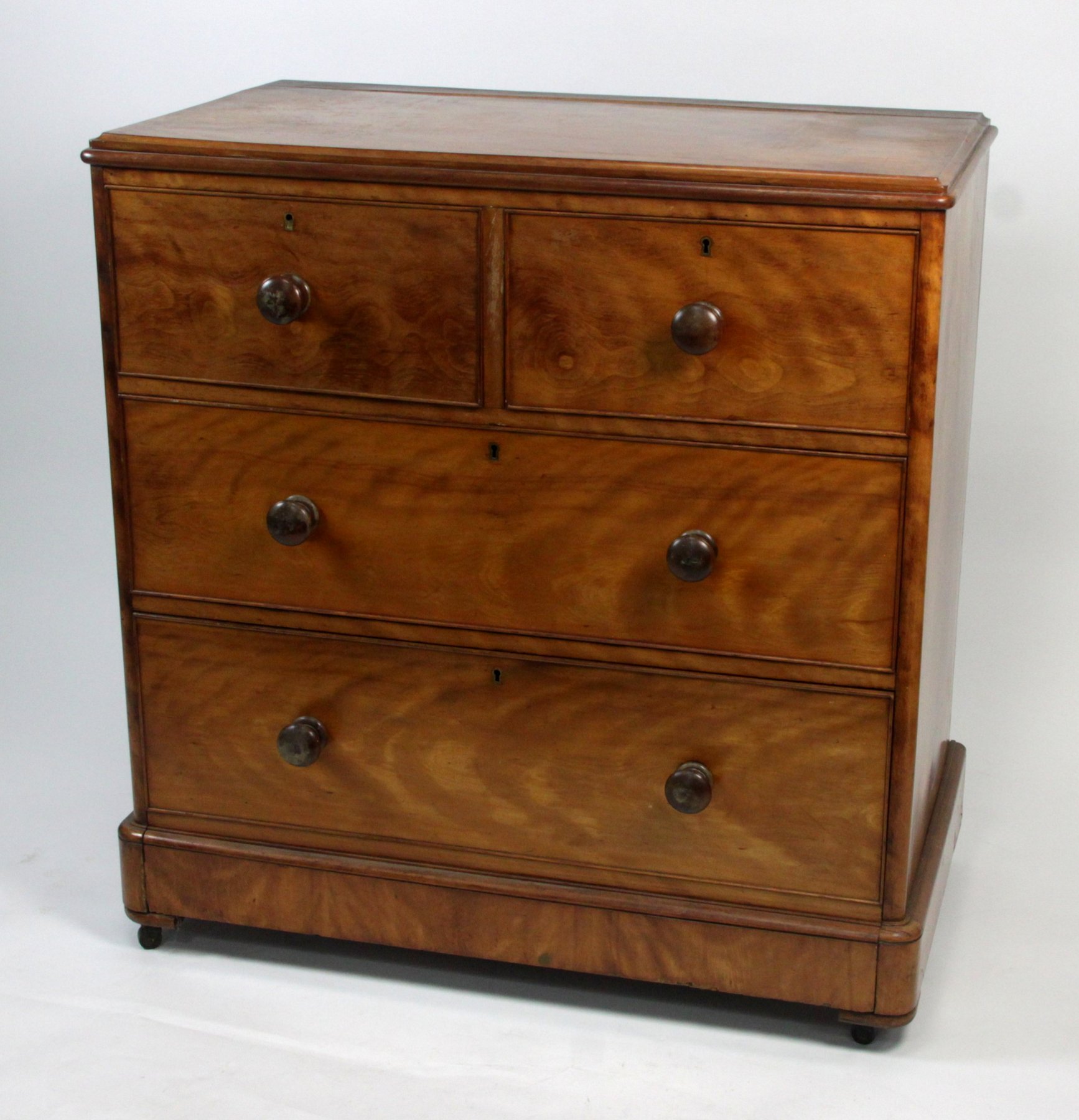 Appraisal: A Victorian satin birch chest of two short and three