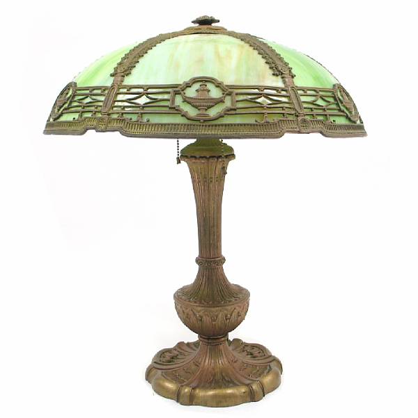 Appraisal: An American gilt-painted metal and slag glass lamp base with