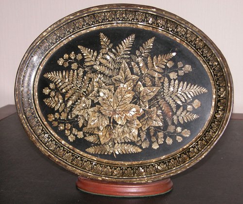 Appraisal: Artist Title Oval tole ebonized and hand painted flower decorated