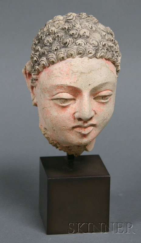 Appraisal: Stucco Head of Buddha Gandhara nd century B C traces