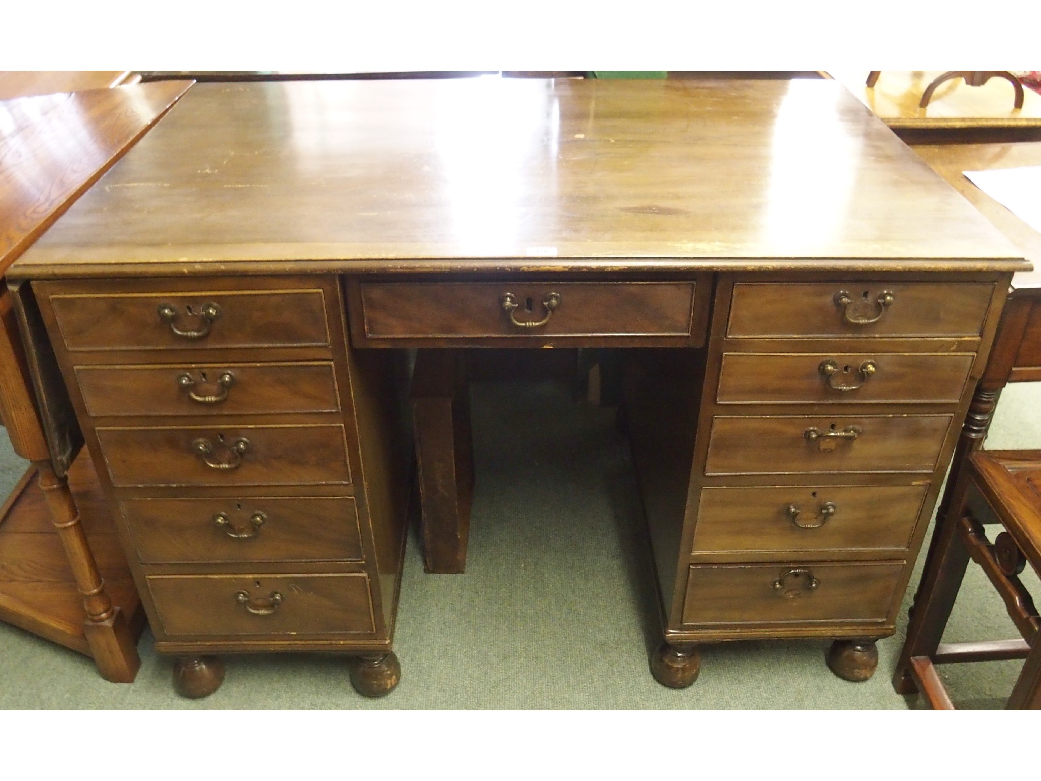 Appraisal: An Edwardian mahogany partners desk def