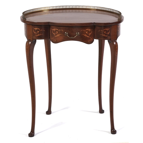 Appraisal: A Victorian kidney shaped mahogany and inlaid lady's writing table