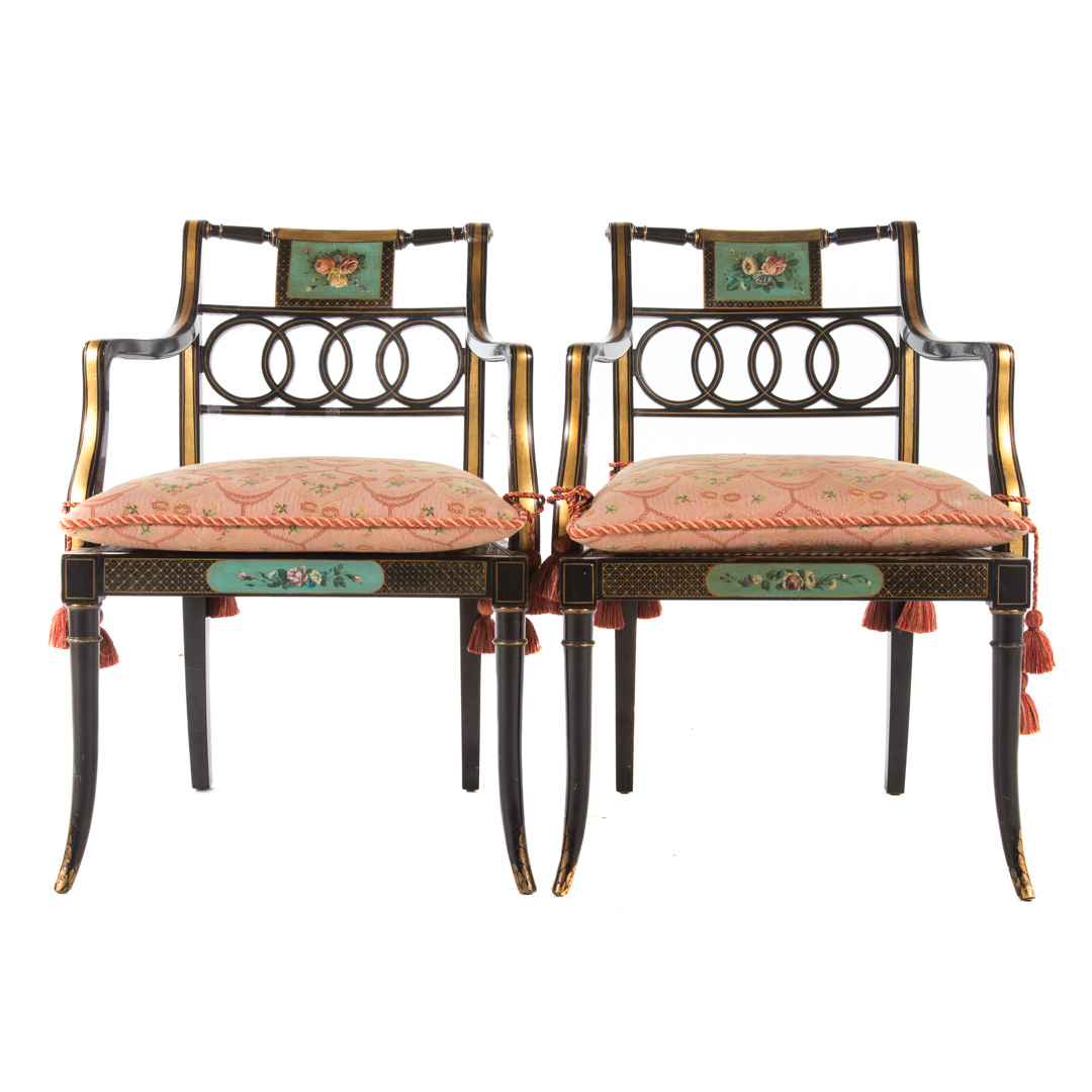 Appraisal: Pair Regency style ebonized gilt armchairs th century curved and