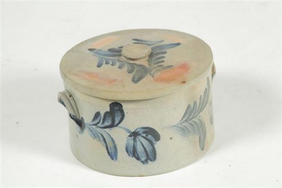 Appraisal: STONEWARE CAKE CROCK American mid th century Brushed foliage on