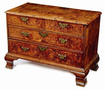 Appraisal: A walnut and burr maple chest the cross and feather