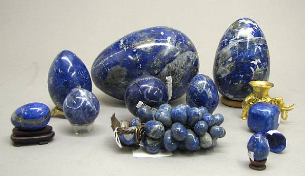 Appraisal: An assembled grouping of eleven lapis lazuli and sodalite table