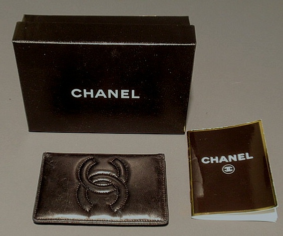 Appraisal: Chanel black leather credit card case with quilted logo dust