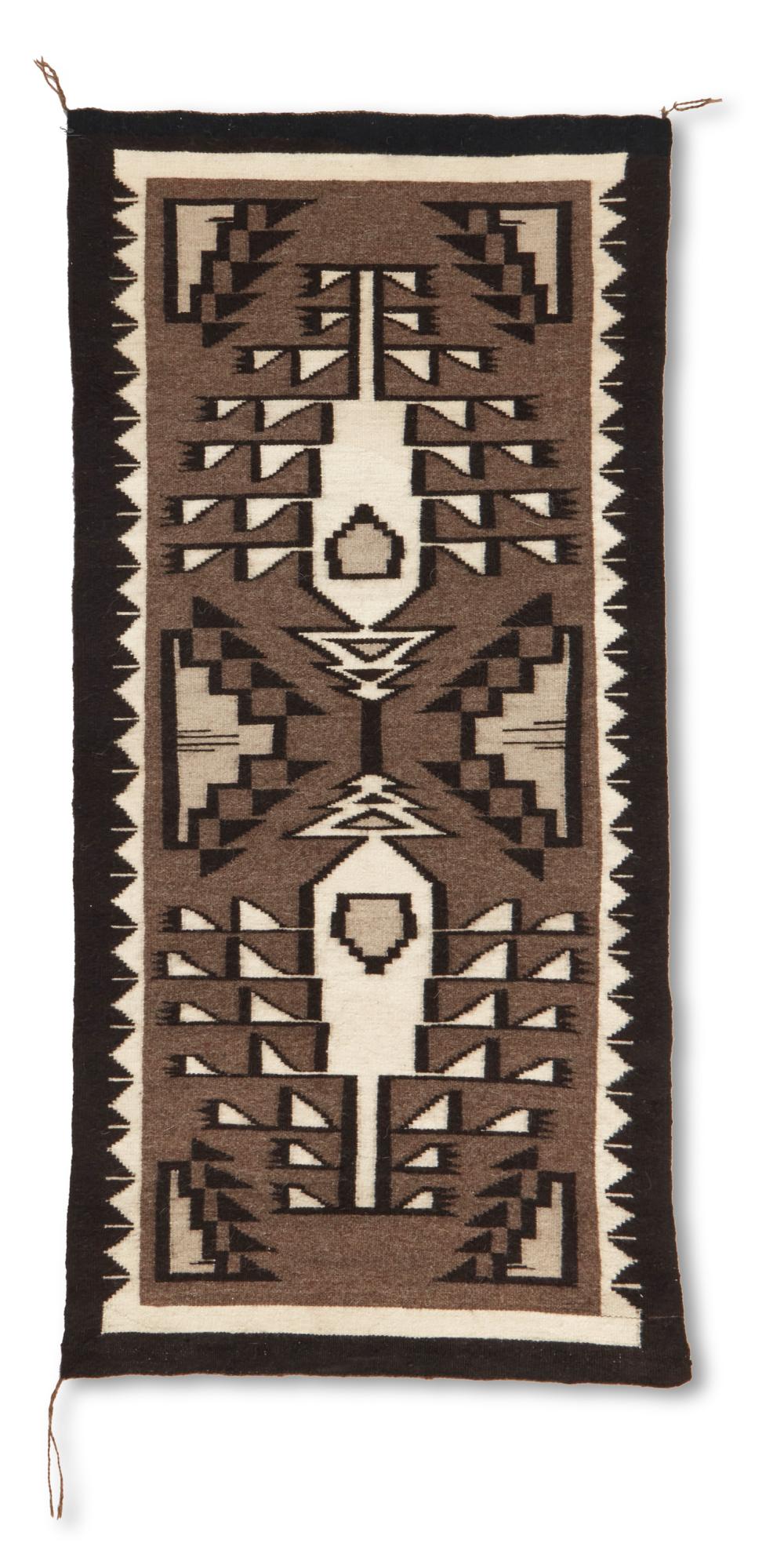 Appraisal: A Navajo Two Grey Hills rug by Christian Bahe th