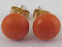 Appraisal: A pair of coral stud earrings coral approx mm diameter