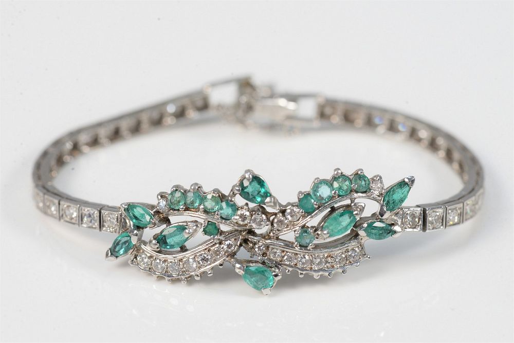 Appraisal: Karat White Gold Bracelet set with emeralds and diamonds length