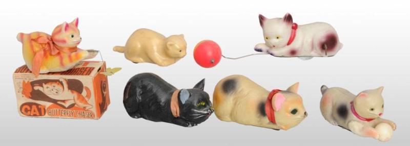 Appraisal: Lot of Celluloid Cat Wind-Up Friction Toys Description Japanese Working