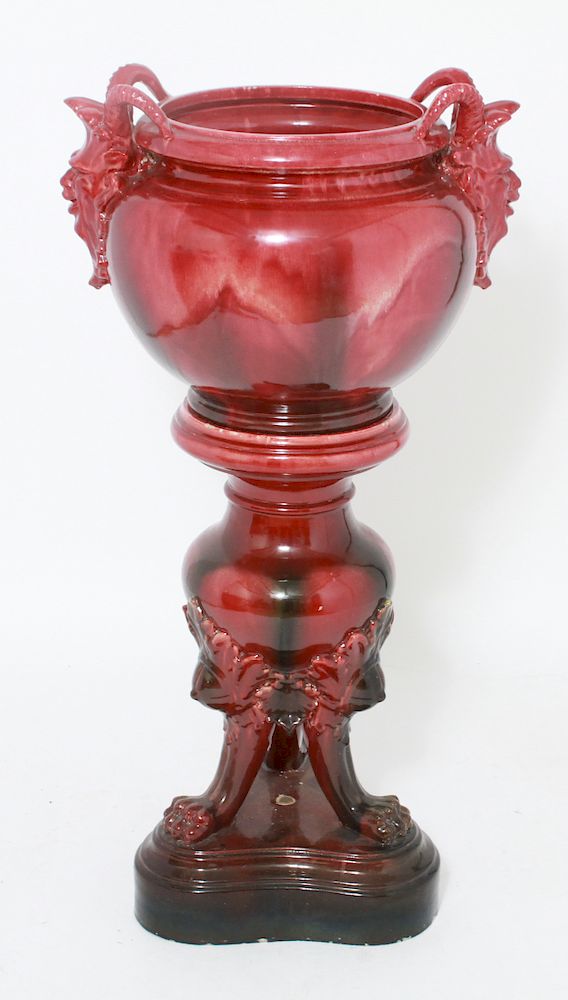 Appraisal: Majolica Red Satyr Mask Jardiniere Pedestal Red majolica jardiniere with