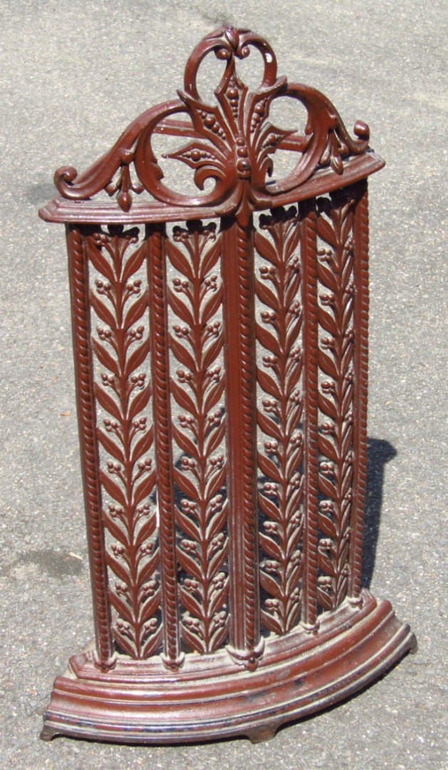 Appraisal: A late thC cast iron corner stick stand surmounted by