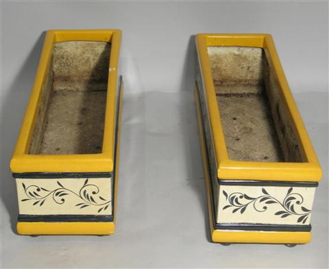 Appraisal: PAIR OF YELLOW GARDEN PLANTERS h w d in