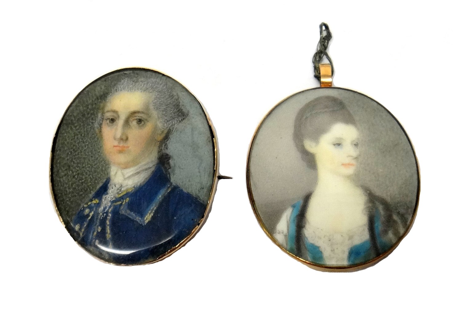 Appraisal: An oval portrait miniature of a lady wearing a blue