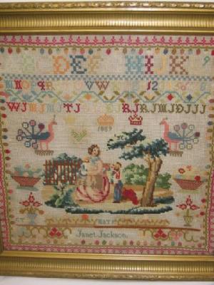 Appraisal: A NEEDLEWORK SAMPLER by Janet Jackson dated comprising alphabet and