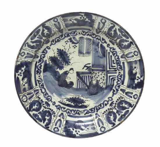 Appraisal: A Delft Charger decorated with a Chinoiserie scene of figures