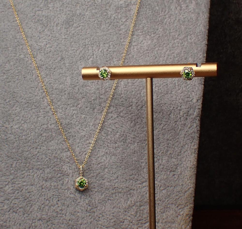 Appraisal: FANCY GREEN DIAMOND PENDANT NECKLACE AND EARRING SET including a