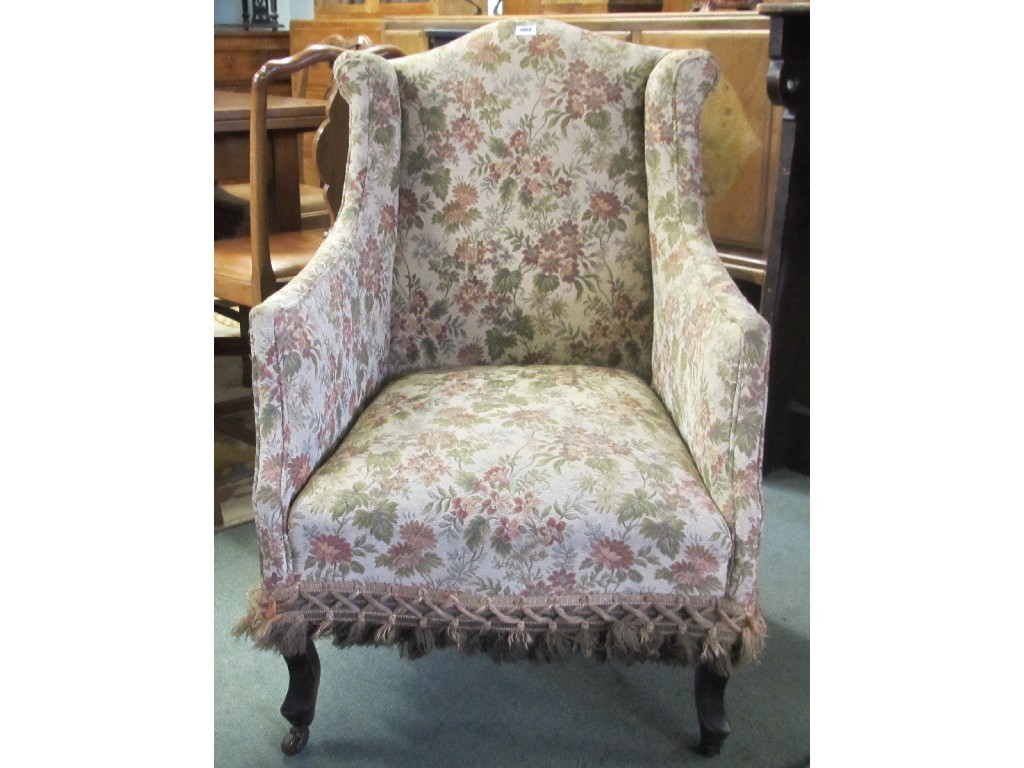 Appraisal: Edwardian floral upholstered armchair