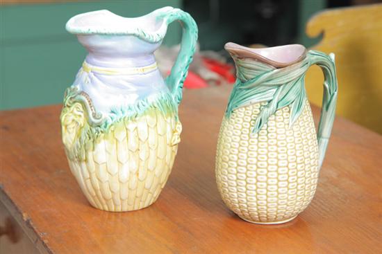 Appraisal: TWO MAJOLICA PITCHERS One having a fence motif goat head